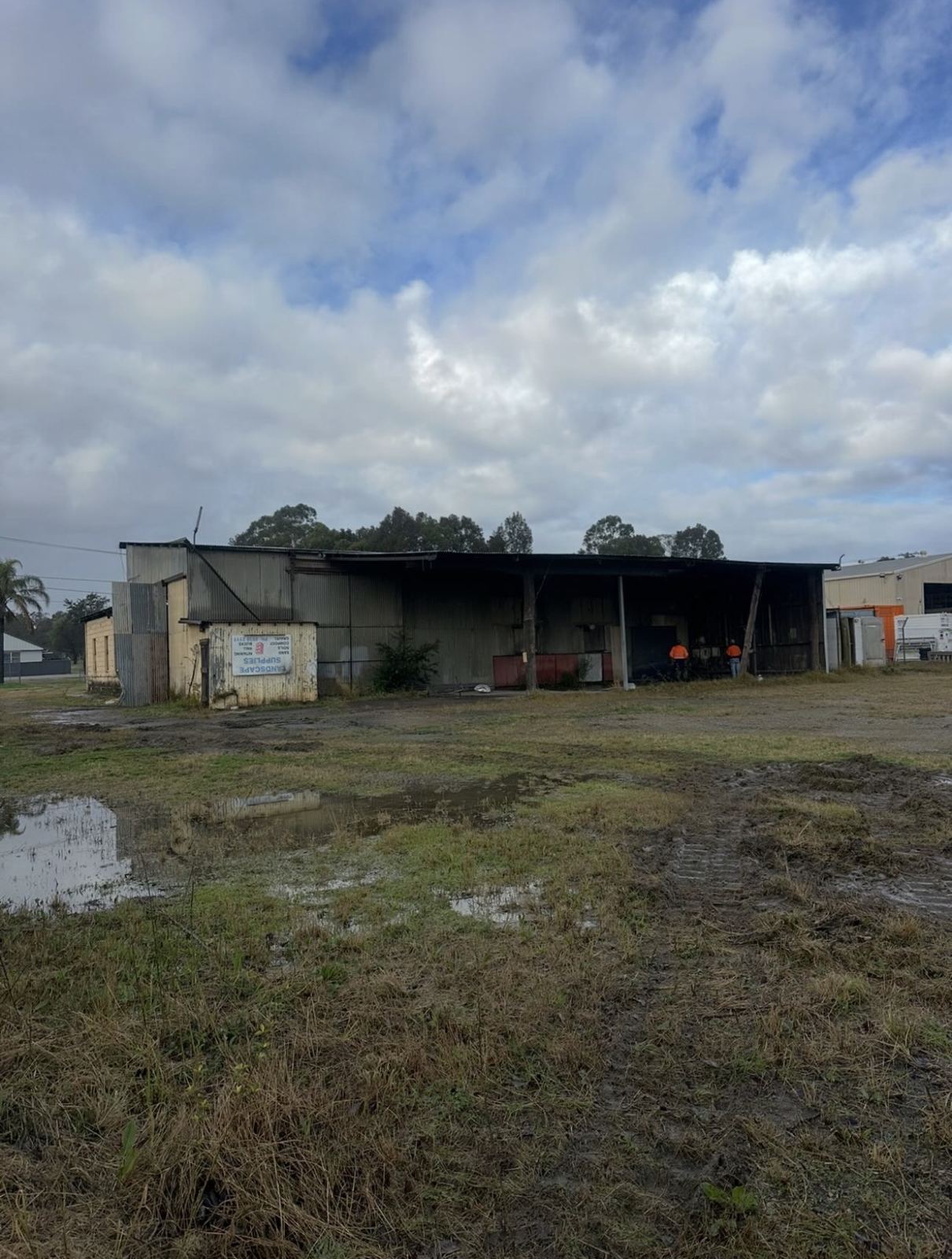 Old shed on block before clearing